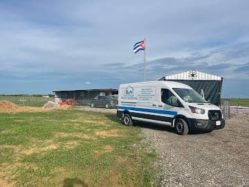 BB&M AC and Heating van on site at a commercial HVAC installation project